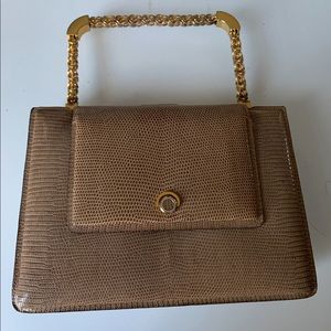 Finesse small tan lizard bag. 8 1/4 x 9 1/2 tall.